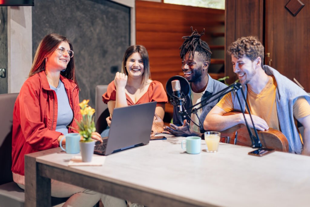 four people recoding a Podcast